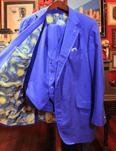 Cobalt blue three-piece suit with a Starry Night style print lining