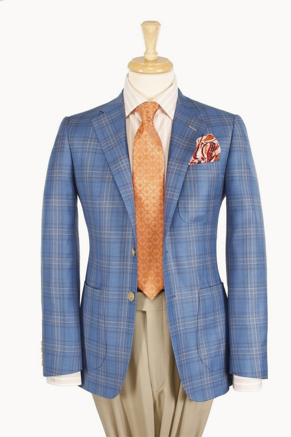 Blue plaid sport coat with tan trousers